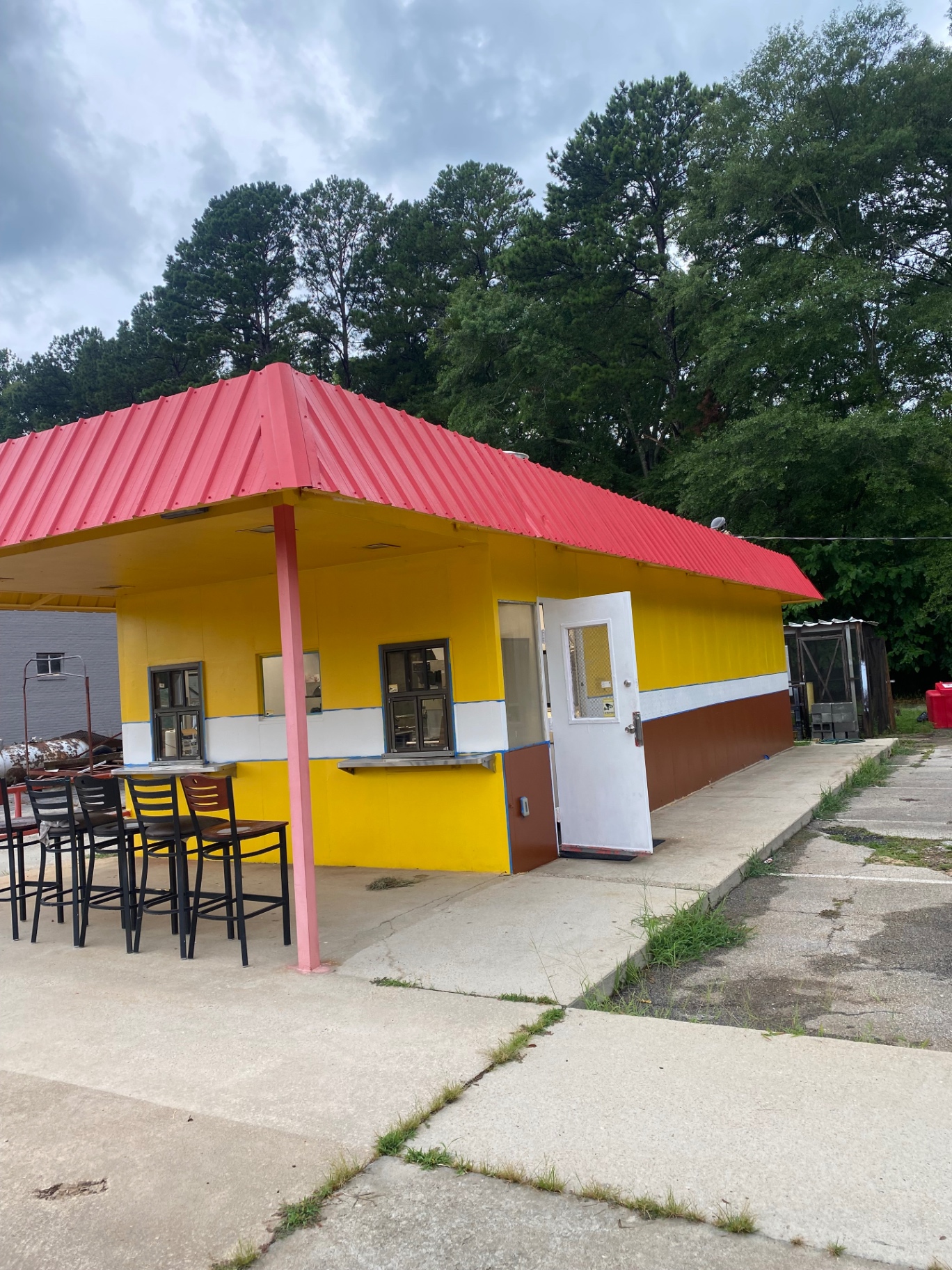 Hogansville Highway Grill — the yellow building with the red roof on US-29